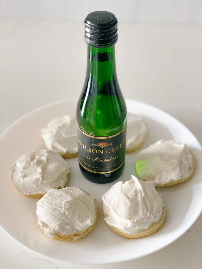 Sparkling Almond frosted sugar cookies with Almond Creek Almond Sparkling Wine