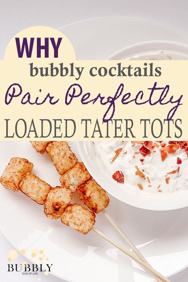 Why bubbly cocktails pair perfectly with loaded tater tots - loaded tater tots on white plate with dipping sauce