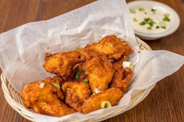 Fried chicken wings really do pair well with bubbly.