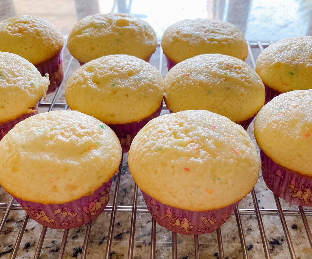 Light and airy, overflowing bubbly cupcakes.