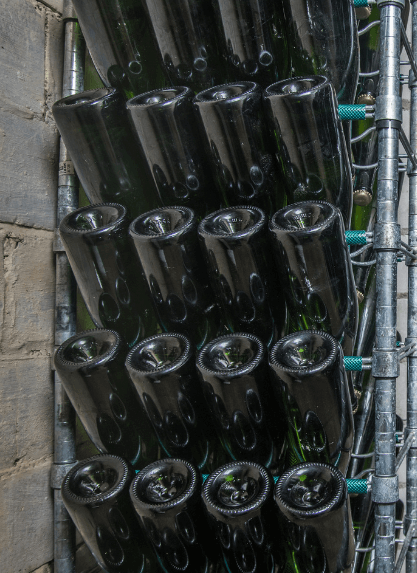 Riddling racks where champagne or sparkling wine ages until it's ready for the finished product.