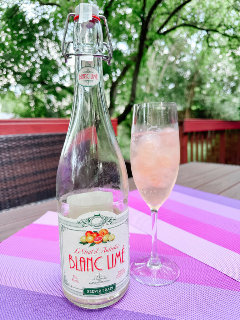 Bubbly drinks are a hit when you pair raspberry boozy ice cubes and Blanc Limé.