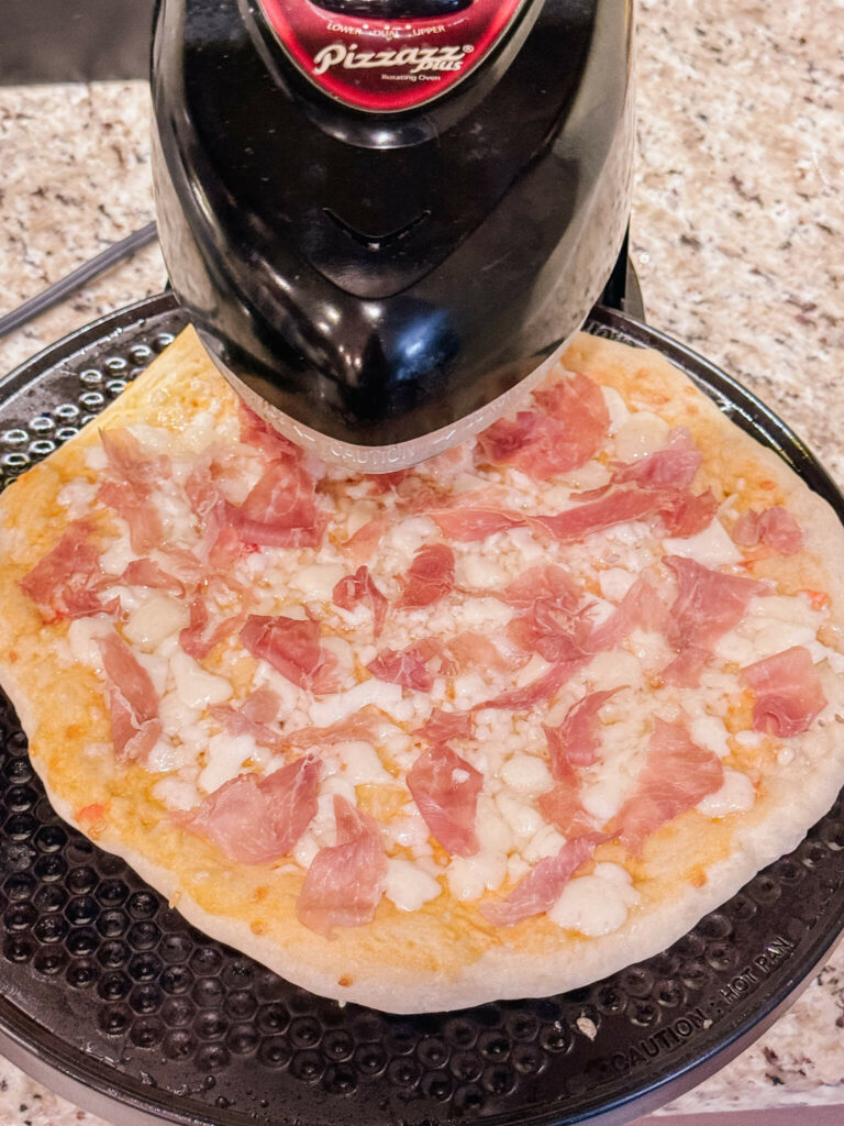 To make the perfect pizza for the pizza and wine pairing, use a Pizzazz to cook the crust first, then add the toppings and continue with the Pizzazz.