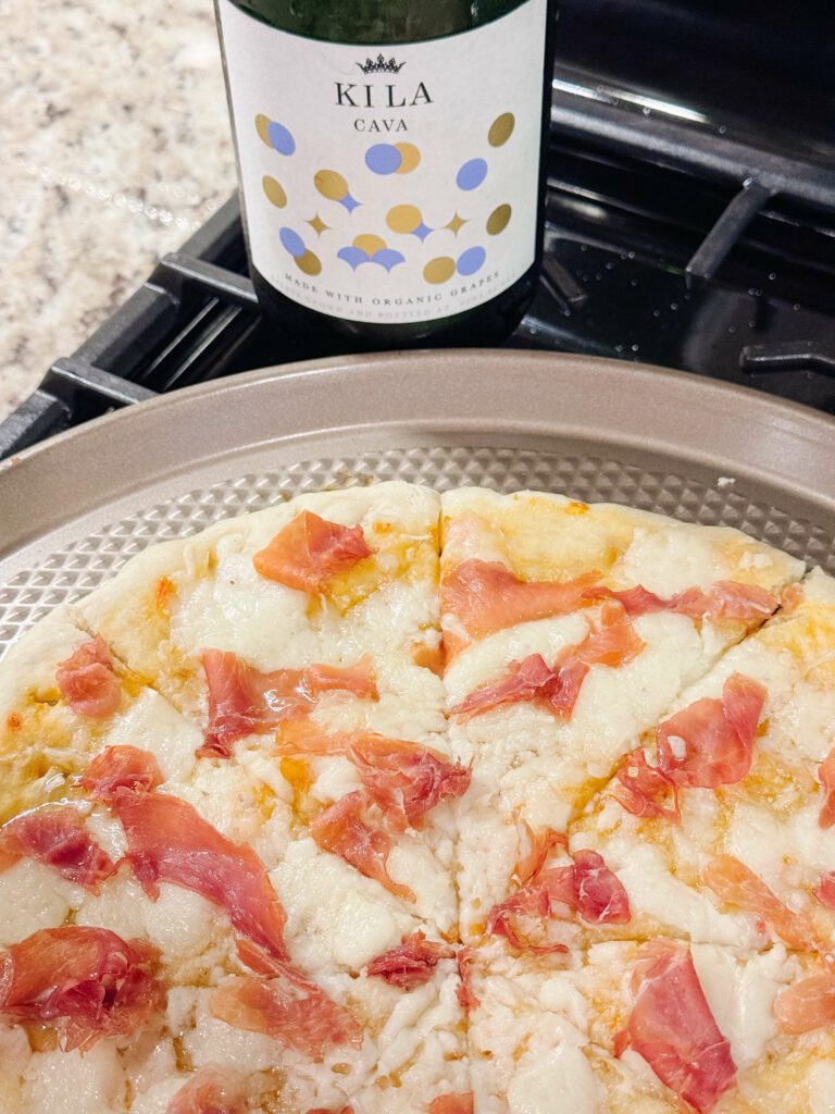 Spanish themed pizza and wine pairing.