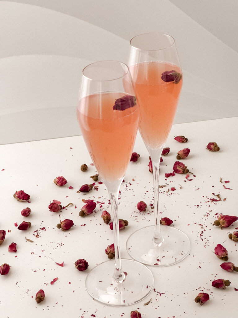 Spring cocktail recipes that are easy and fun with the perfect rose flower garnish.